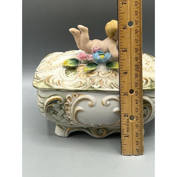 Vtg Bisque Porcelain Trinket Box with Baby Cherub & Floral Design 6" Bath Salts - Picture 3 of 13